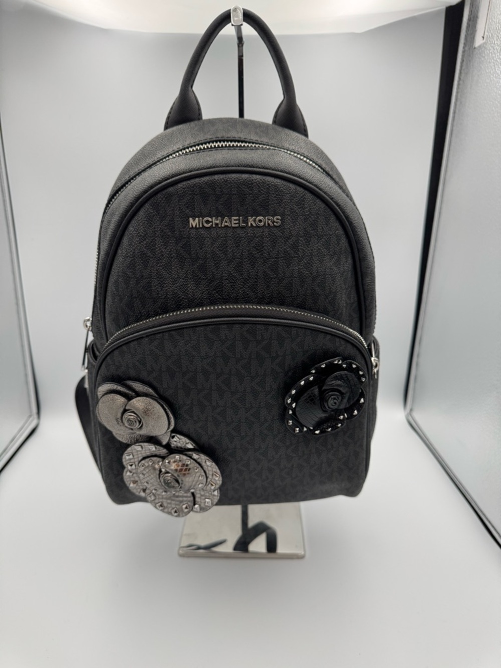 Michael Kors Black Signature Logo Mini Backpack with Floral Stud Accents